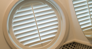 Shutters ronde ramen